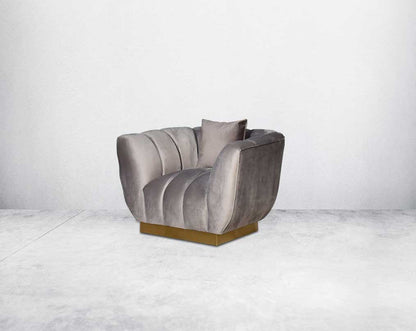 This gorgeous neo-classic 1 seater sofa is upholstered in high-quality velvet fabric with a vertical quilted backrest that accentuates simplicity and comes with 6 beautiful cushions to compliment.