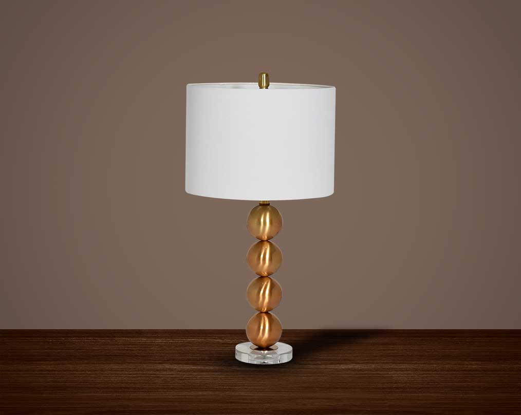 Table lamp  white colour with metallic gold and glass decorative base with translucent fabric shade.