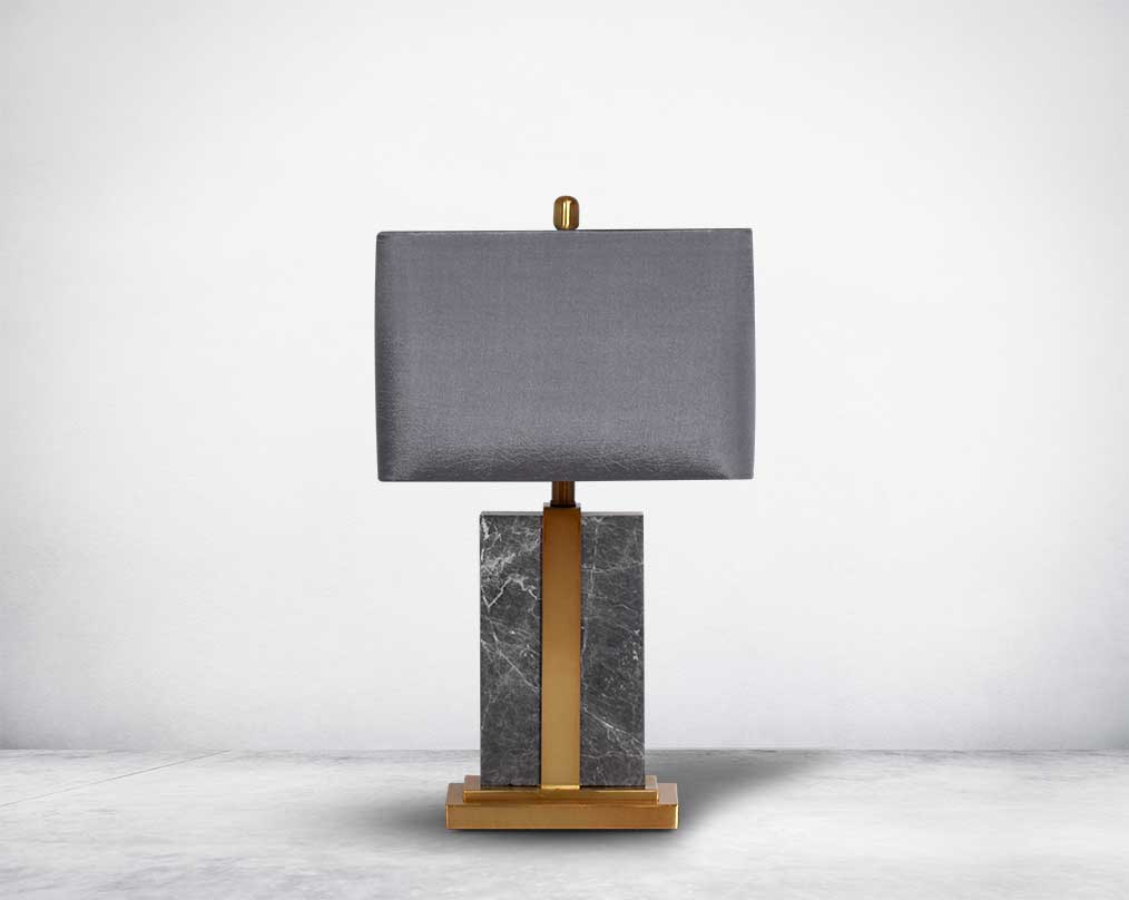 Table lamp with marble & metal base with translucent fabric shade in ultra modern design.