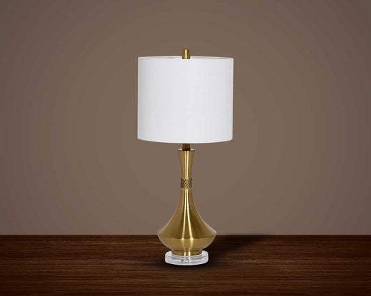 Table lamp in metallic gold and crystal with translucent fabric shade.