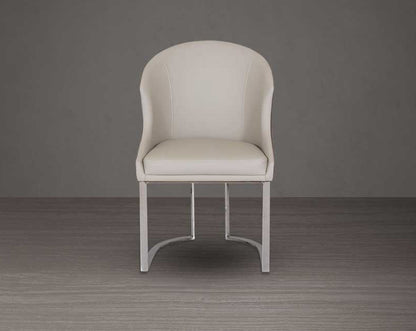This dining chair front with stands resplendent with a rich contemporary look. It is crafted in faux leather upholstery and comes in two colours with glossy, silver-plated, stainless steel legs