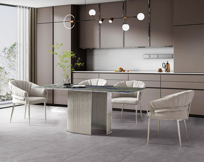 This predominantly eclectic and contemporary dining chair is upholstered in boucle fabric with glossy stainless steel frame & legs which is perfect around any dining table.