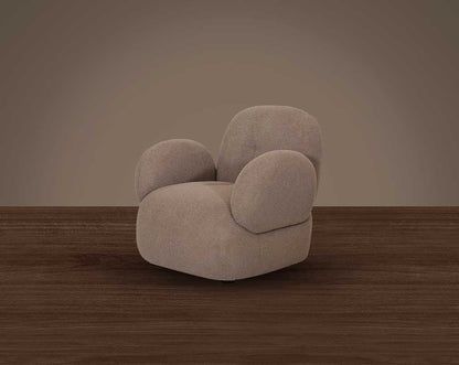 This sinuous & soft 1 seater sofa exudes a sense of calm & ease, upholstered in high-quality boucle fabric with wooden legs side view