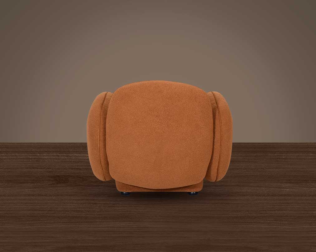 This 1 sofa set behind  is an embodiment of modern elegance with clean lines softened by subtle curves.