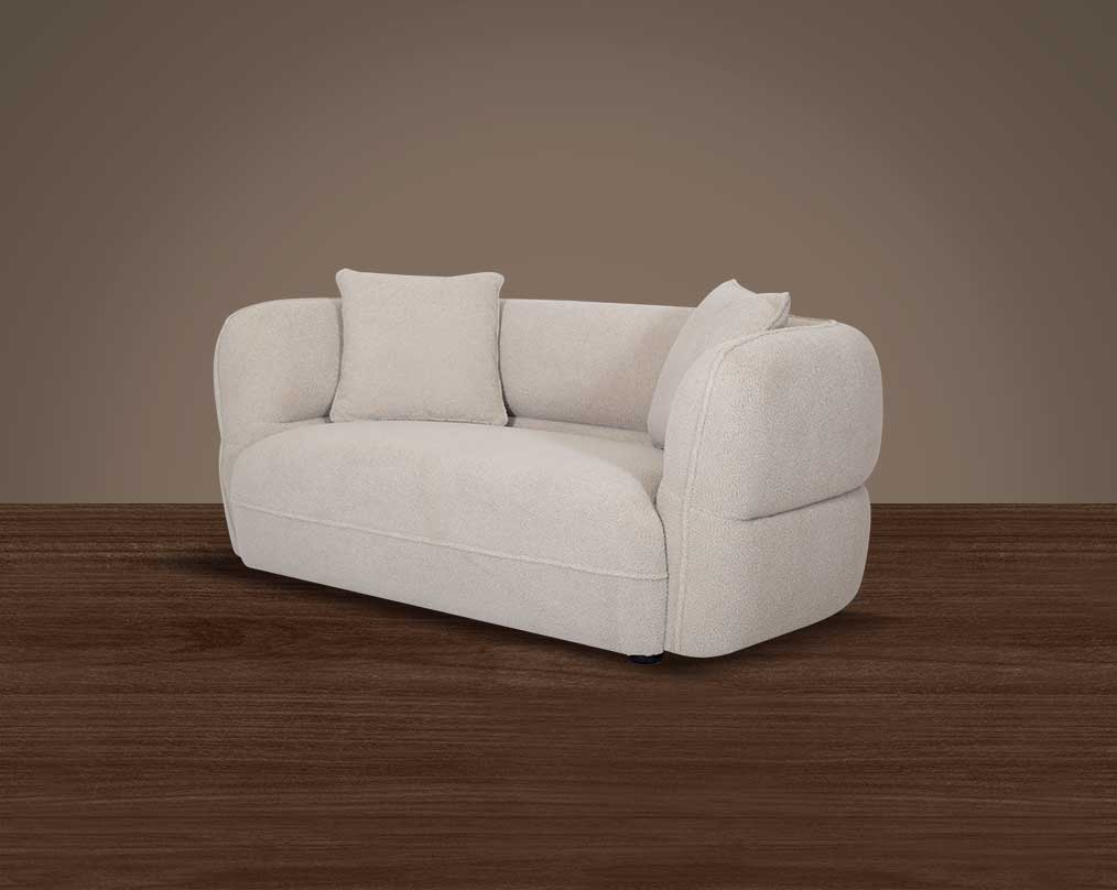 This sofa set with pillow and white colour is an embodiment of modern elegance with clean lines softened by subtle curves It has elegantly rounded armrests and a soft seat cushion which comes in high-quality boucle fabric