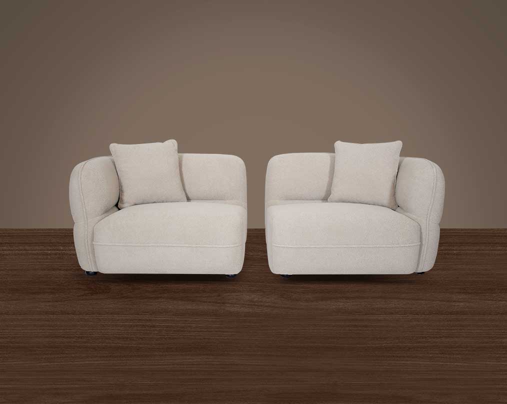 This 1+1  sofa set with white colour  is an embodiment of modern elegance with clean lines softened by subtle curves. It has elegantly rounded armrests and a soft seat cushion which comes in high-quality boucle fabric