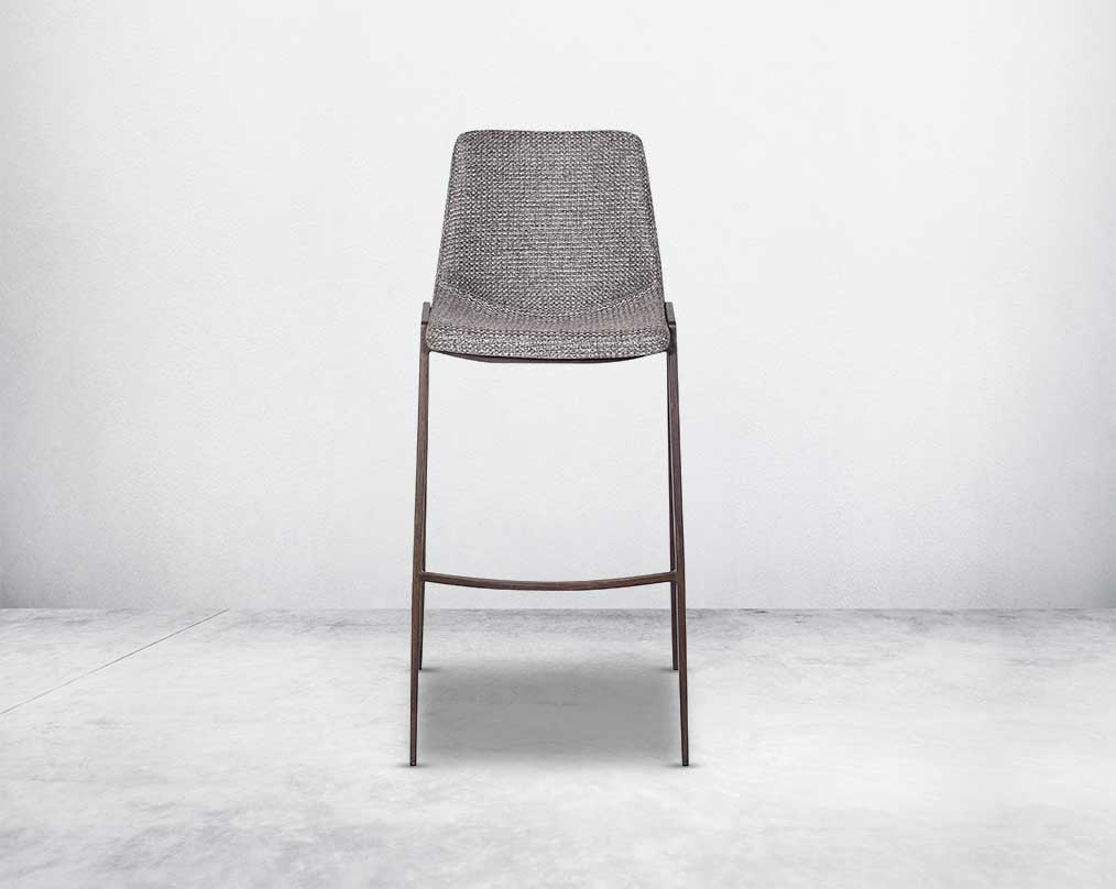 this wooden bar stool front with is a striking mix of industrial and modern. The supple seat, upholstered in fabric sits atop a stainless steel base in wood finish.