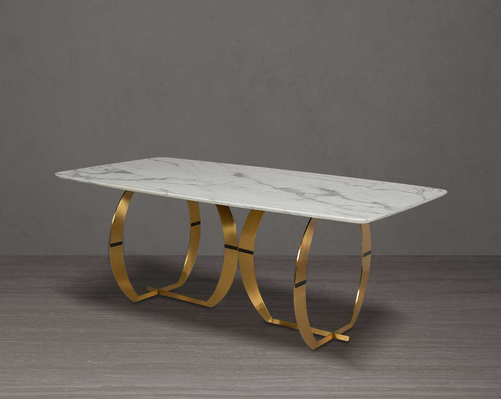 This beautiful & delicate 6 & 8 seater marble dining table is crafted to perfection. It is cast with a natural white a cursive artful base in matt gold plated stainless steel