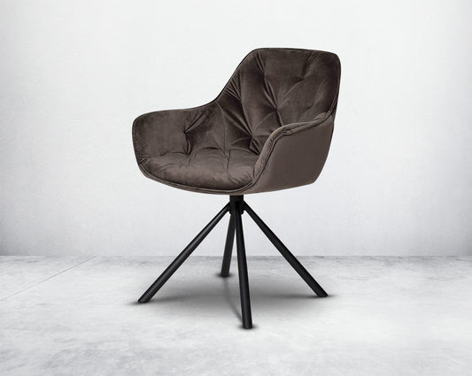 This soft, cushioned dining chair features an extraordinary contemporary design with tufted back and cushioned seat with metal legs.It is upholstered in velvet fabric which will certainly elevate the style of your space.