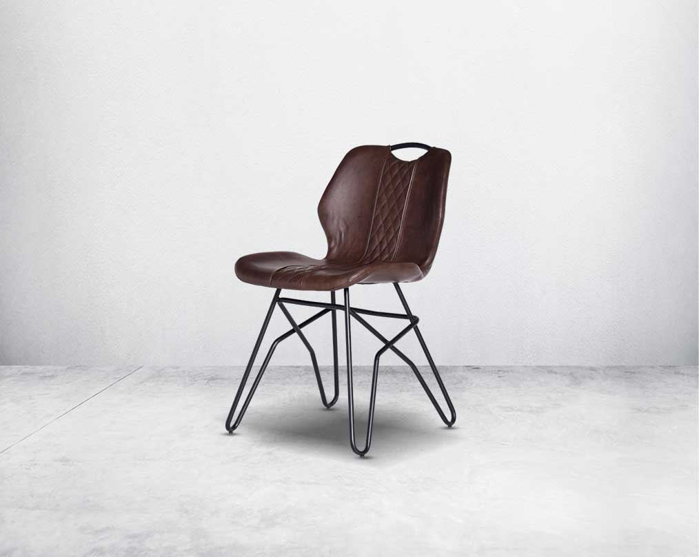 This soft, cushioned dining chair features an extraordinary contemporary design with tufted back and cushioned seat with metal legs