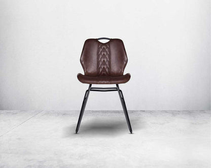 This soft, cushioned dining chair features an extraordinary contemporary design with tufted back and cushioned seat with metal legs front view