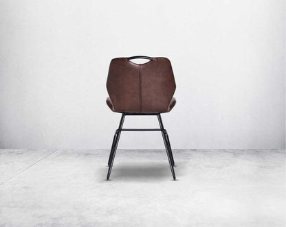 This soft, cushioned dining chair back  features an extraordinary contemporary design with tufted back and cushioned seat with metal legs