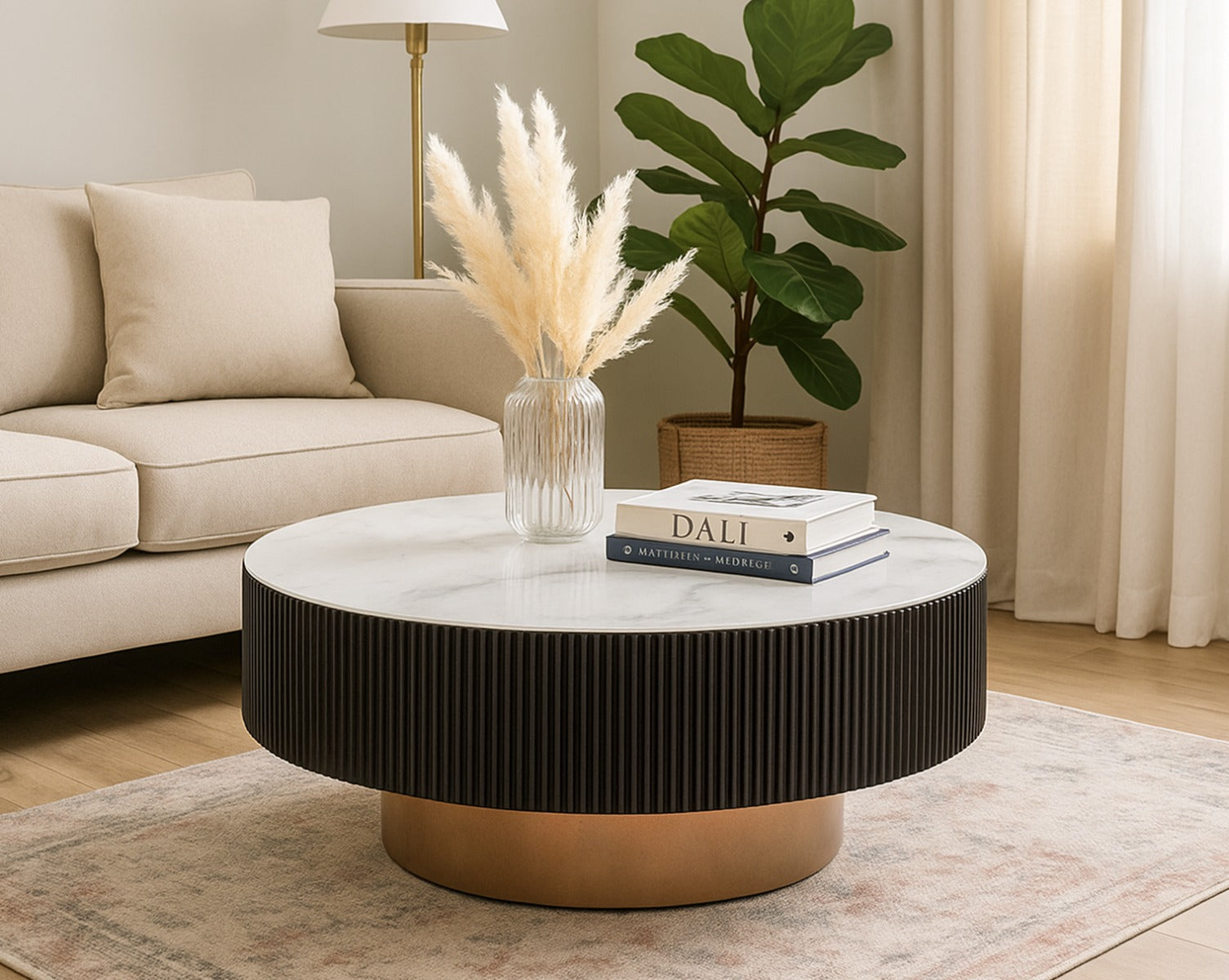 This round coffee table with white snow tempered marble finish glass top & waive grain matt black wood frame