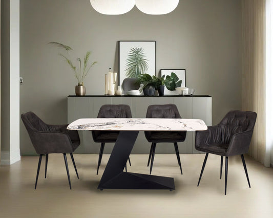This 6-seater minimalist dining table is an embodiment of modern glamour This soft, cushioned dining chair features an extraordinary contemporary design