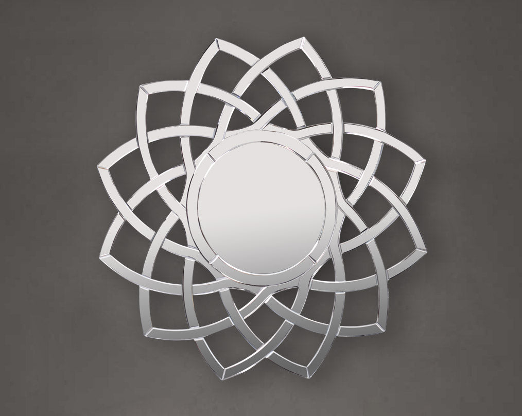 Wall mirror in a floral design motif is perfect to enhance any living or powder bathroom space with sliver colour