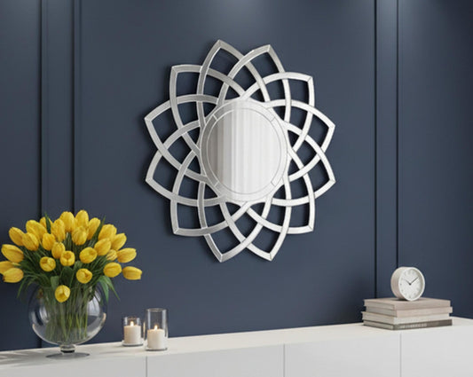 Wall mirror in a floral design motif is perfect to enhance any living or powder bathroom space with sliver colour