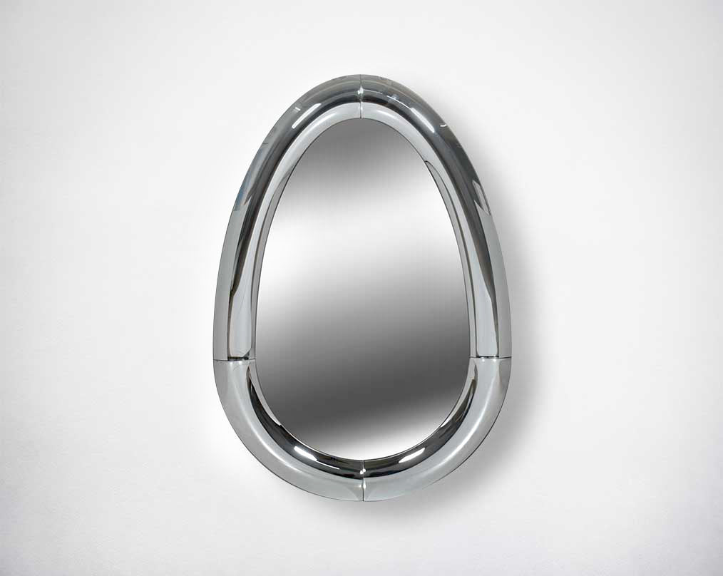 Elliptical wall mirror with silver curved mirror border in rich contemporary design.