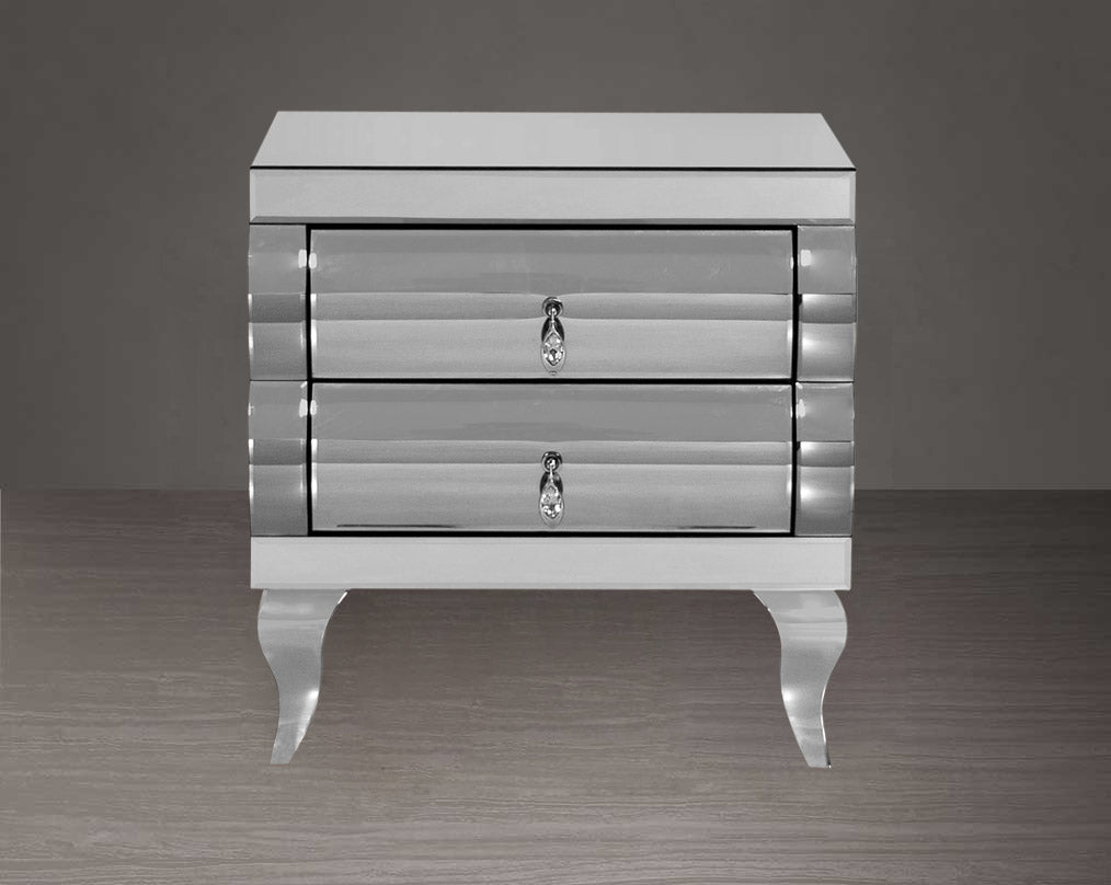 Bedside table with closed drawer  in silver curved mirror with legs in stainless steel.