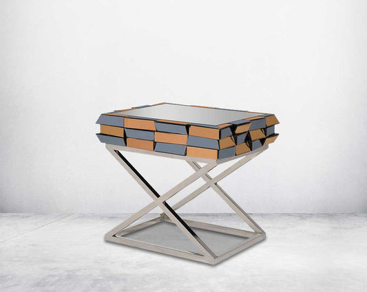 End table with clear glass top with grey & tawny mirror & high polished stainless steel legs in a cross design side view