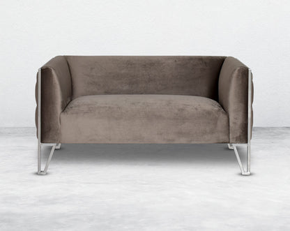 This 2  seater sofa set is the perfect addition to any living space looking to add a modern classic feel. Crafted beautifully with high polished stainless steel geometric legs and upholstered in luxurious velvet