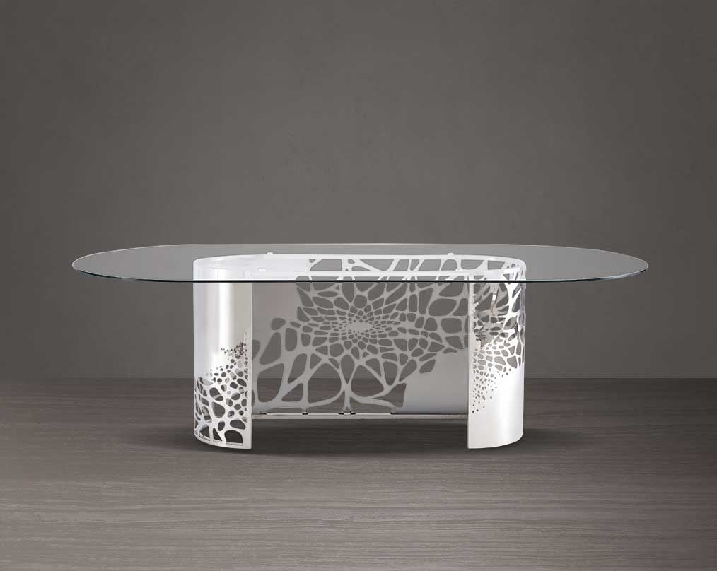 This exquisite & beautiful dining table with an artistic laser cut base in glossy stainless steel base with clear bevelled tempered glass top in a sumptuous the style of your space.