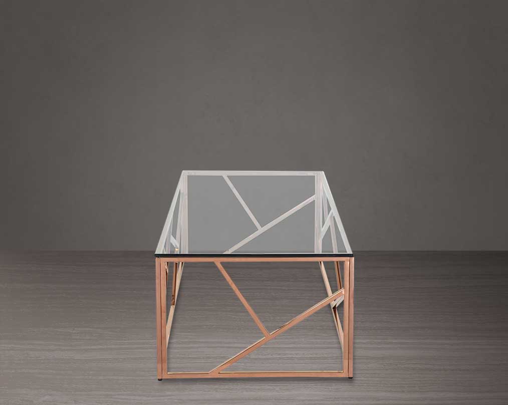 Coffee table with clear glass top and rose gold plated stainless steel frame in sleek contemporary design.