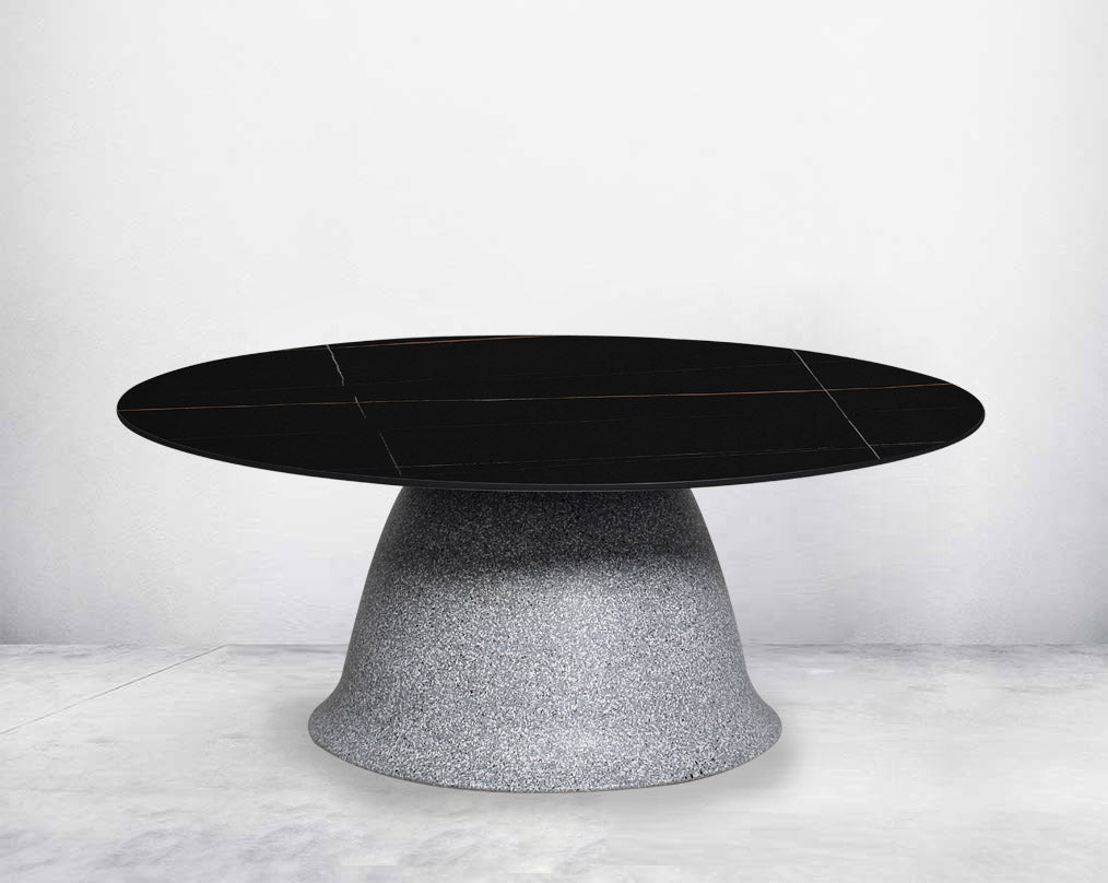 This round coffee table in sleek modern style comes with a sintered black - Large