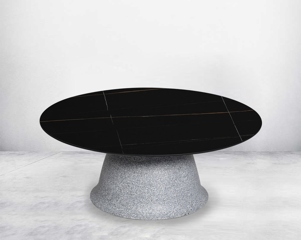 This round coffee table in sleek modern style comes with a sintered black - Small
