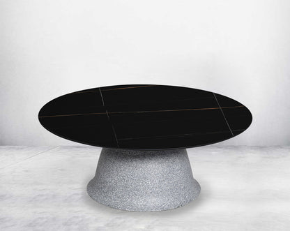 This round coffee table in sleek modern style comes with a sintered black - Small