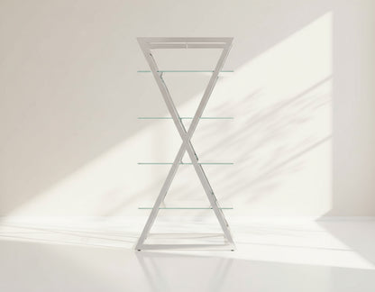 Defined by its essence this display unit relishes a premium look with its clear glass shelves seated on a vertically crisscross stainless steel frame. 