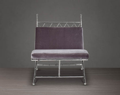 Lounge chair  front with upholstered in fabric with high polished stainless steel frame in bamboo design.