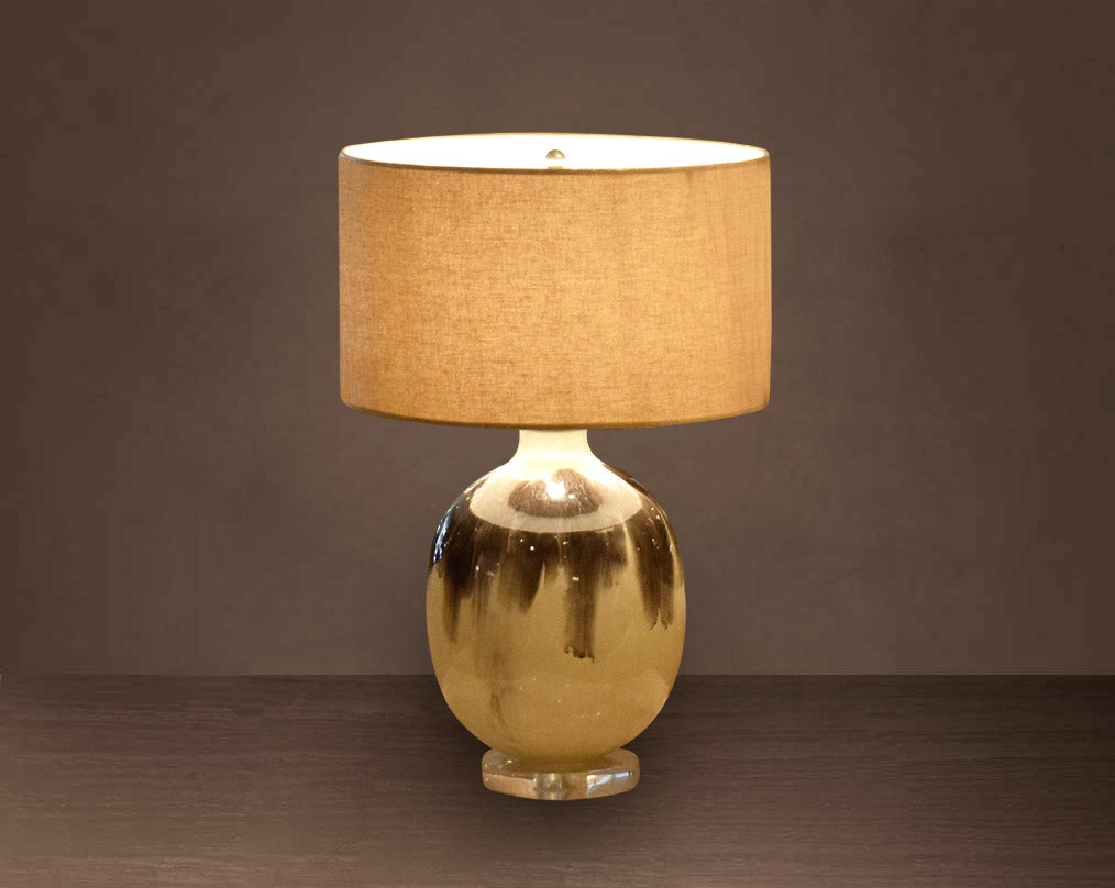 Glass Table lamp in Melting Moss Enamel feel with translucent beige fabric shade.
