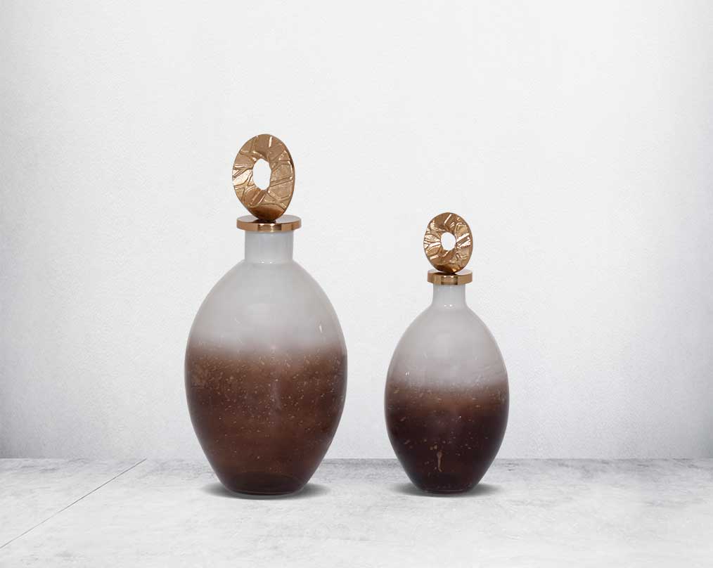Decorative bottle in champagne & teak crust tinted lustre glass with ornamental antique gold plated aluminium lid.-1bottle large 2 bottle small
