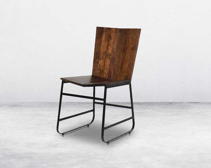 This sleek straight wooden dining chair in dark walnut finish & black coated metal base in minimalistic design
