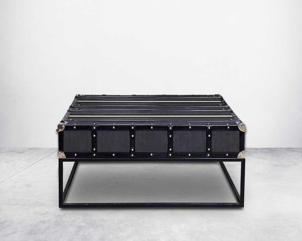 This coffee table inspired by the vintage trunk design motif makes a true focal point in any in modern, contemporary or eclectic decor back view 