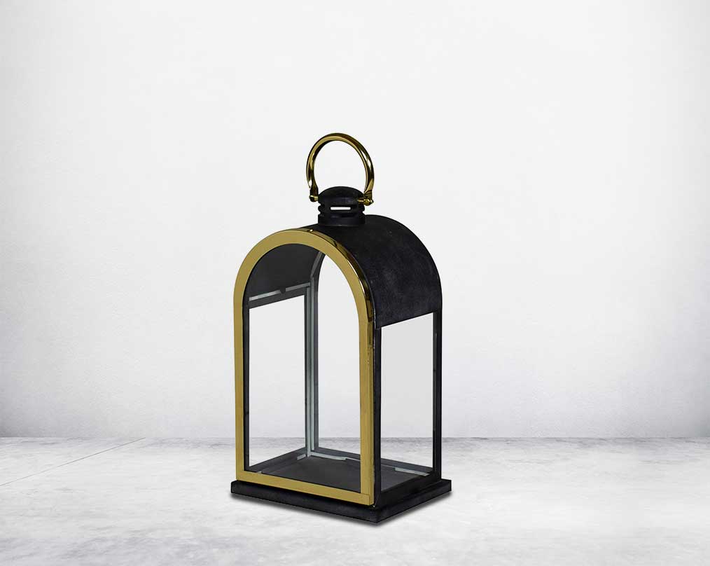 Lantern in clear glass and metal with gold plated stainless steel frame.