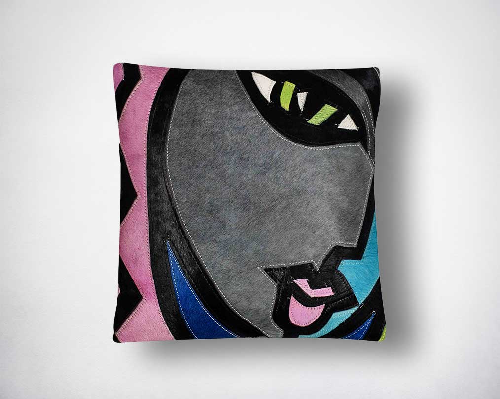 Multi-coloured hair on the leather cushion.