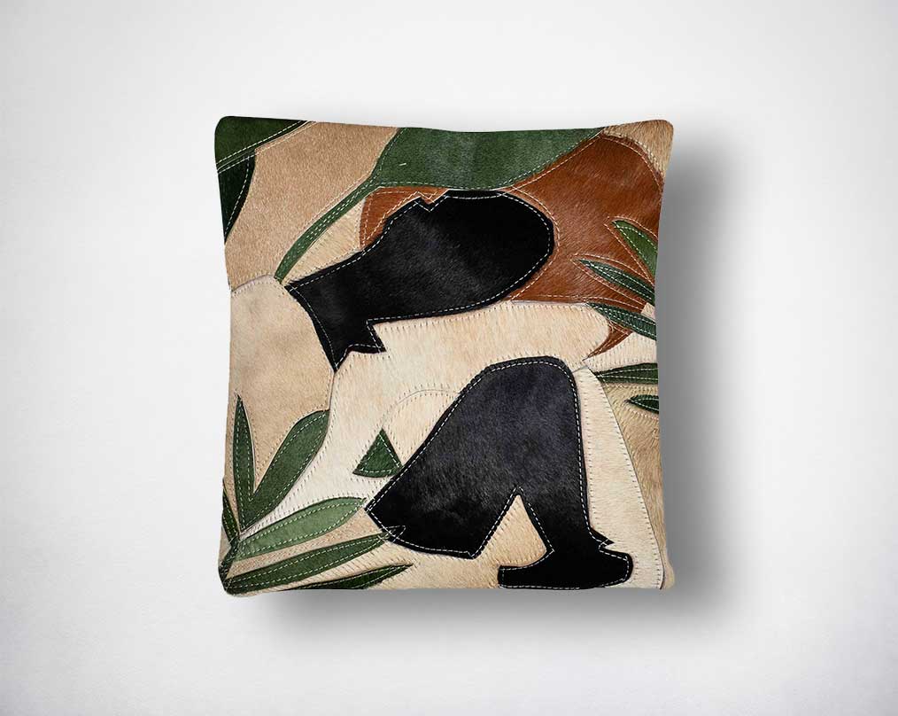 Black, beige, olive, green & tan hair on the leather cushion.