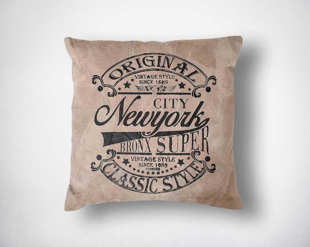 Sand recycled suede leather cushion with print.