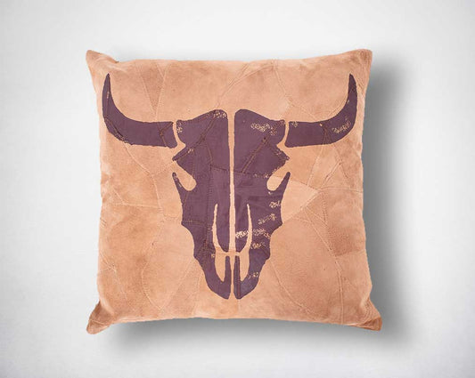 Beige & brown bull print leather cushion.