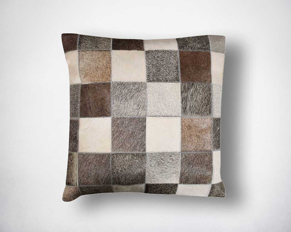 Black and grey hair on leather cushion.