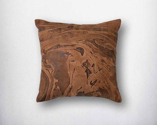 Tan leather cushion with marble design/foil.
