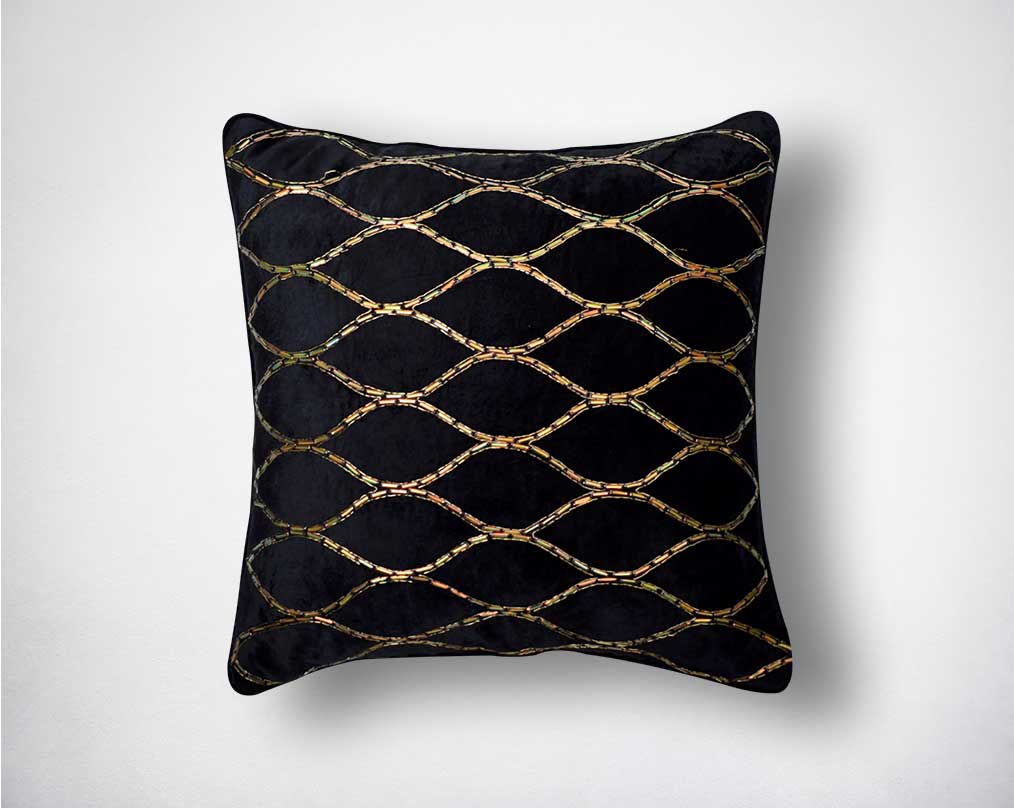 Shiny gold beaded poly silk black embroidered cushion.