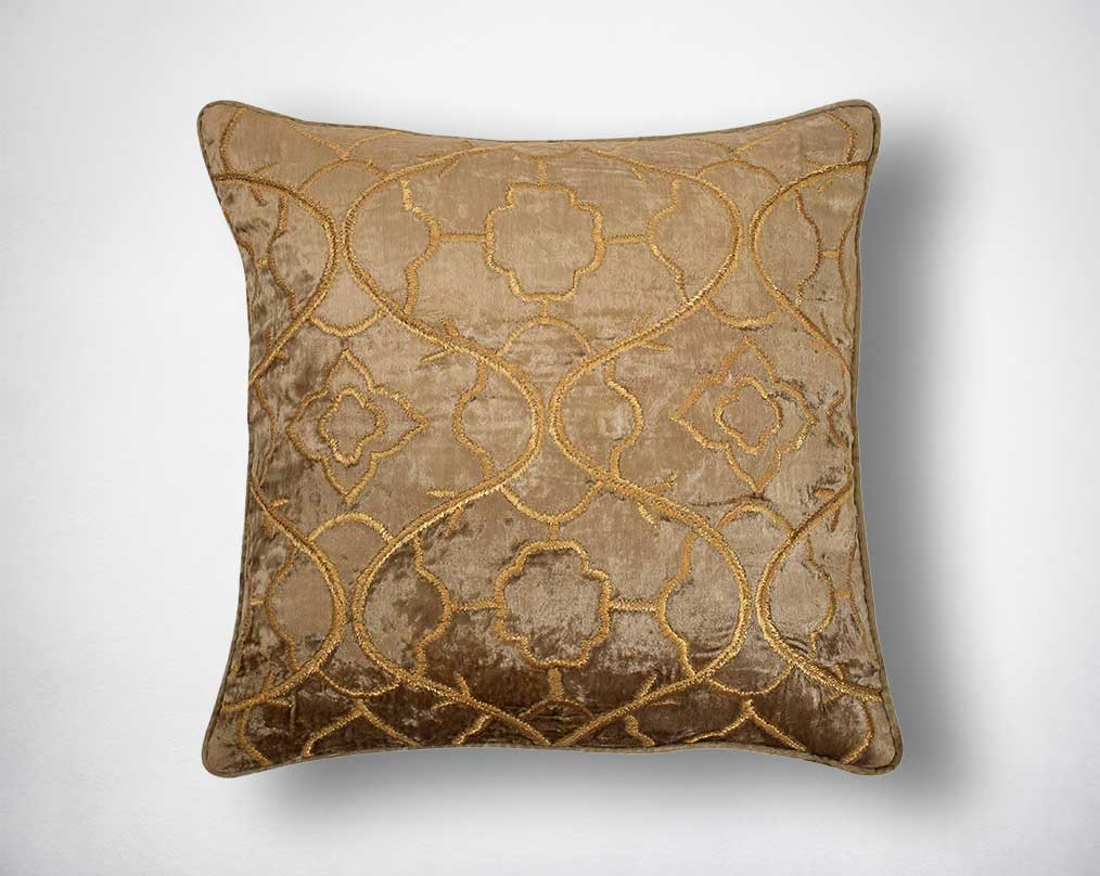 Gold poly silk embroidered cushion.