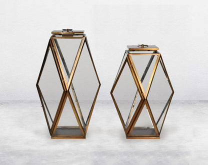 Lantern with clear glass and brass-plated stainless steel.