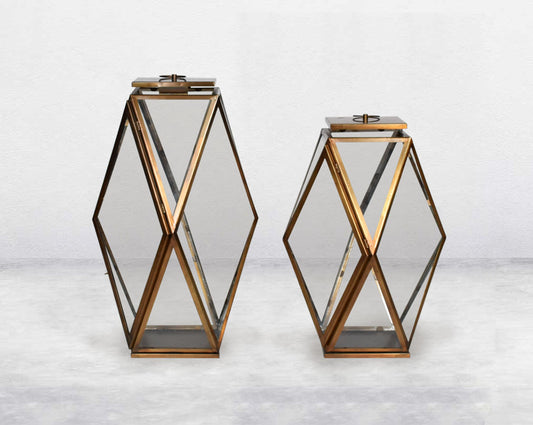Lantern with clear glass and brass-plated stainless steel.