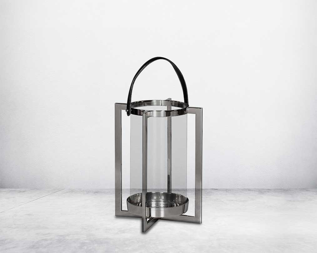 this lantern A master of reimagining classic forms, solid sheet metal frames feature broad panels of clear glass in a circular design large 