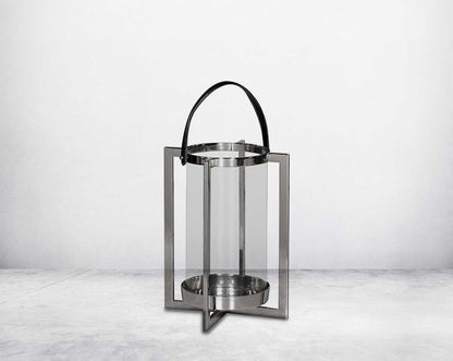this lantern A master of reimagining classic forms, solid sheet metal frames feature broad panels of clear glass in a circular design large 