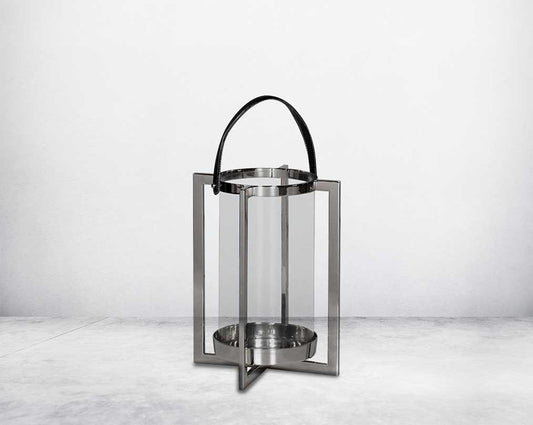 this lantern A master of reimagining classic forms, solid sheet metal frames feature broad panels of clear glass in a circular design large 
