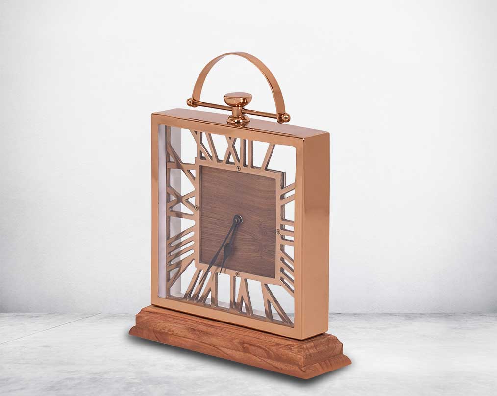 Square table clock in rose gold and wood in natural polish with side view  roman numerals.